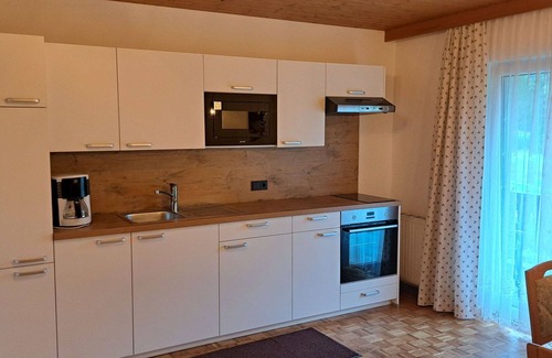 Oberwang Villa | Cosy apartment in villa for 5 people with WIFI, TV and balcony