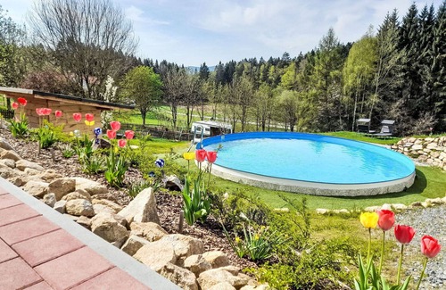 Oberkreuzberg House | Cosy apartment in villa for 6 people with pool, WIFI, hot tub, TV and patio