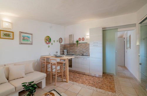 Eden Beach Villa | Cosy apartment in villa for 3 guests with A/C, pool, WIFI, TV and patio