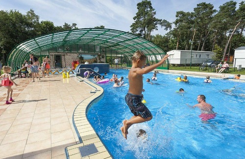 Schaarsbergen House | Cosy apartment in villa for 6 guests with WIFI, pool, TV, terrace, pets allowed and parking