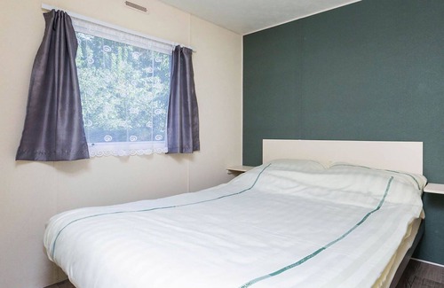 Schaarsbergen House | Cosy apartment in villa for 6 guests with WIFI, pool, TV, terrace, pets allowed and parking