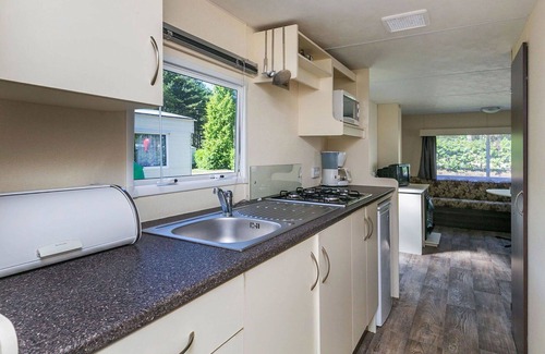Schaarsbergen House | Cosy apartment in villa for 6 guests with WIFI, pool, TV, terrace, pets allowed and parking