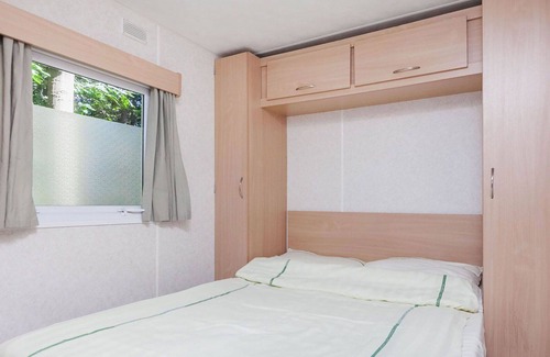 Schaarsbergen House | Cosy apartment in villa for 4 guests with WIFI, pool, TV, terrace, pets allowed and parking