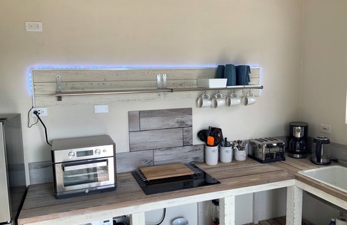 Rainbow Bay Cottage | Cosy beach cottage, centrally located and steps away from Rainbow Bay Beach