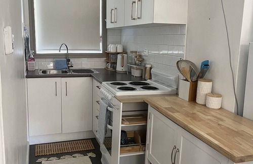 Woonona Apartment | Cosy coastal retreat 300m from beach self contained 1st floor apartment