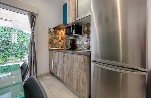 Colonia de la Prensa Apartment | Cosy flat with terrace and spaces for remote working in Madrid