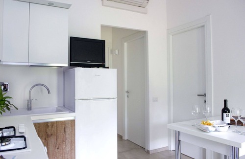 Le Rocchette House | Cosy apartment in villa for 5 people with pool, hot tub, WIFI, A/C, TV and patio