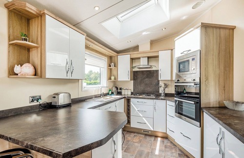 Kirkcudbright Ski Chalet | Country and modern cladded lodge.