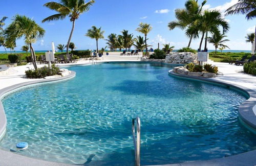 Wheeland Settlement Condo | Couple’s Retreat! Condo with ocean views, pool, and hottub!