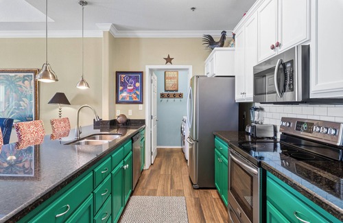 South Padre Island Condo | Courtyard condo with pool only 1/4 block to beach!