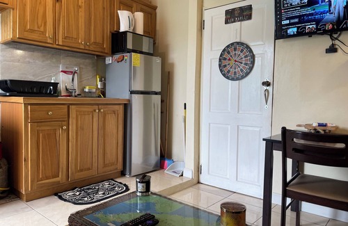 Bon Accord Village Apartment | Cozy 1-bedroom apartment with WiFi, Pool near the Airport & Store Bay Beach