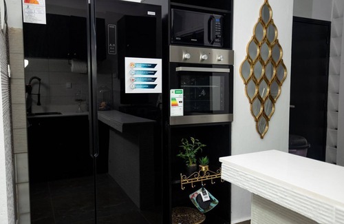 Presidence Apartment | Cozy 1-bedroom flat in downtown Plateau-Abidjan, where nature and serenity meet.