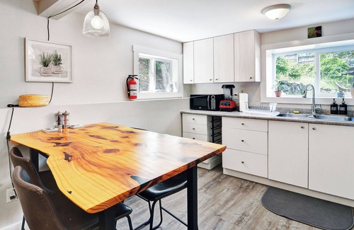 Heritage Downtown House | Cozy 1-BR suite with ocean views, full kitchen, projector, and garden