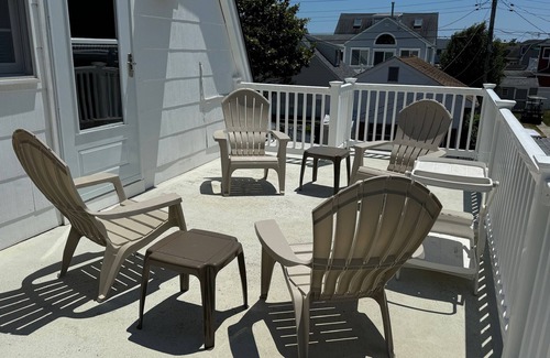 South End Cottage | Cozy 2-bdrm cottage 2nd floor in quiet south end Ocean City. AC, WiFi, big deck.