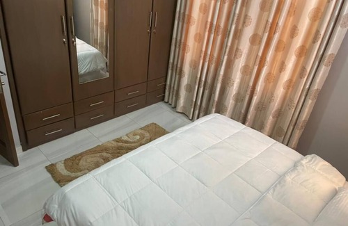 Adenta Apartment | Cozy 2 bedroom flat with pay tv, internet, easy access to shops and malls