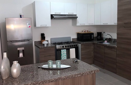 Playa Bibijagua Apartment | Cozy 2-Bedroom Condo with 2 pools by the beach