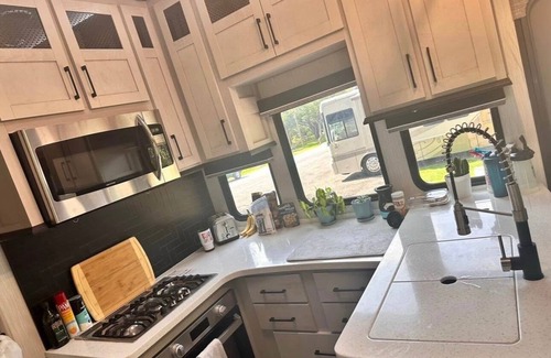 Granbury House | Cozy 2-bedroom RV in charming Granbury. 2 miles from downtown and Lake Granbury.
