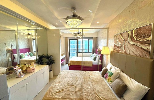 Malate Apartment | Cozy 2 Beds for Family of 4 facing Manila Bay in Shore Residences