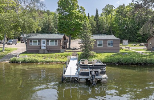 Phelps Cabin | Cozy 2BR/1BA Lake Cabin | 25ft from Shore | Boat Landing | Fish House | All-Sports Lake