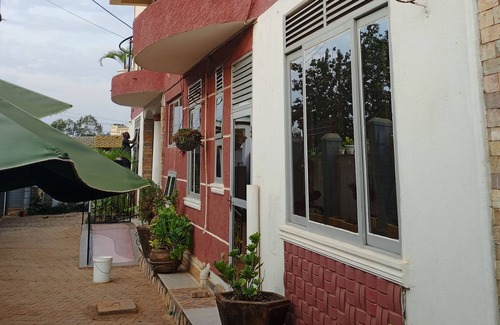 Kireka House | Cozy accessible workspace at Trinity Resort. Good Vibes only