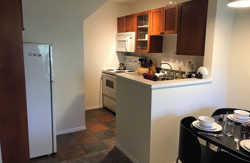 Village North House | Cozy and Bright 1BR Townhouse with big, open deck. Free parking