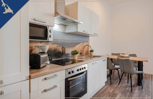 Koserow Apartment | Cozy apartment for 4 near the beach, with a terrace, parking space and WiFi