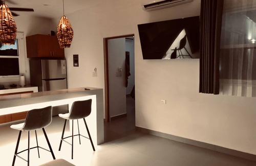 Chicxulub Puerto Condo | Cozy apartment with ocean view & pool
