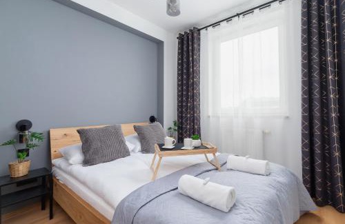 Lagiewniki Apartment | Cozy Apartment with Balcony Chmieleniec by Noclegi Renters