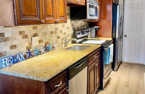 Sea Isle City Condo | Cozy beach condo just one block from the beach. Walk to restaurants and parks.