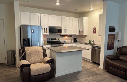 Fort Lupton House | Cozy bedroom in a townhome in Fort Lupton with AC, WiFi