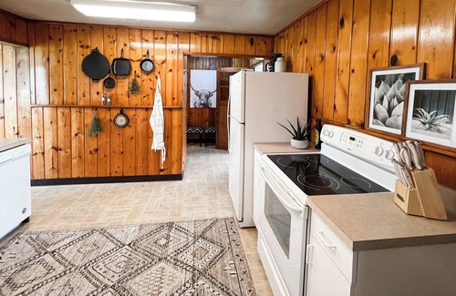 Five Corners House | Cozy cabin in town w/ sunroom, huge playset/backyard, dog yard, fire pit, BBQ