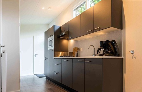 Veen Ski Chalet | Cozy Chalet With Microwave in a Wetland Area
