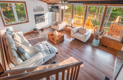 Wymbolwood Beach Cottage | Cozy Cottage Across from Blue Waters with Hot Tub!