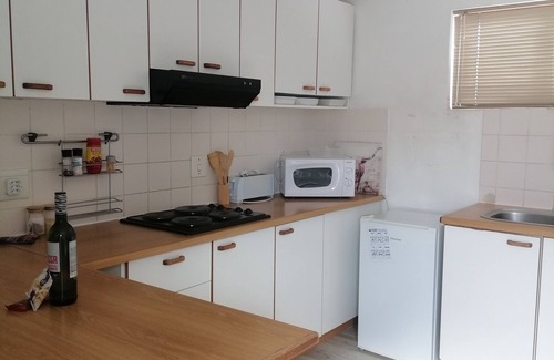Cape Town Cottage | Cozy cottage for family getaway with private patio and pool in safe suburb.