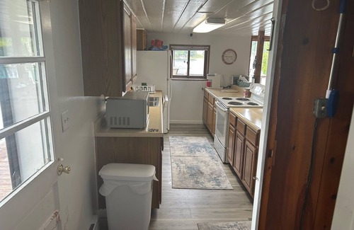 Curtis Township Cottage | Cozy cottage in Glennie MI on all sports North Lake with deck, dock & firepit.
