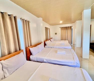 Catangnan House | Cozy Family Studio - Ronaldos Inn Twinex Suite