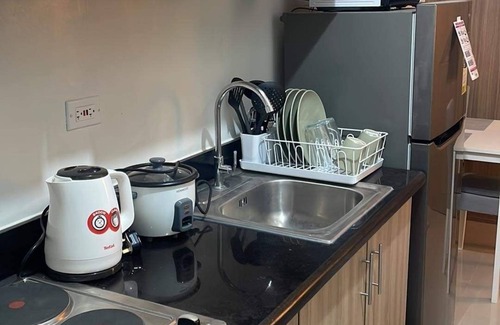 Baclaran Condo | Cozy High Floor 1-bedroom condo with AC, WiFi in Shore 2 Tower 3