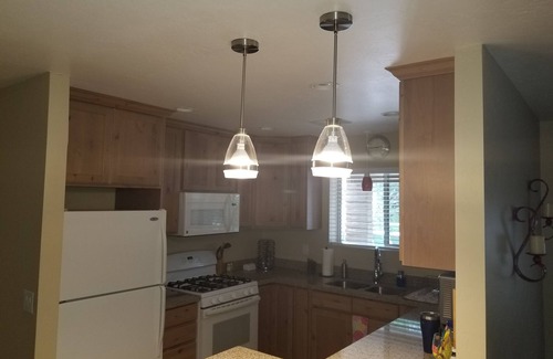 Prescott House | COZY HOME WITH LARGE SHADED BACKYARD. HOT TUB,CORN HOLE,FIREPIT,