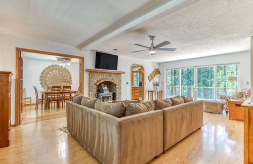 Zigzag House | Cozy home with river access, private hot tub, wood stove, fireplace, & W/D