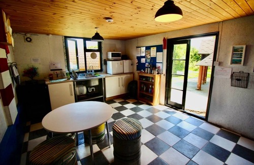 Llanfairpwllgwyngyll Cabin | Cozy Hot Tent with Log Burner & Hot Tub Right Tent