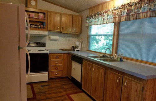 Hawkins House | Cozy Lakefront Family Friendly Home With Large Covered Porch And Private Dock.