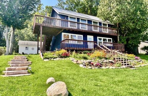 Rapid City House | Cozy Main Level Torch Lake Stay with Private Entry & Fire Pit