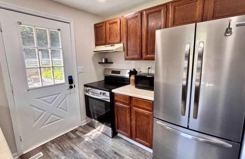 Rapid City House | Cozy Main Level Torch Lake Stay with Private Entry & Fire Pit