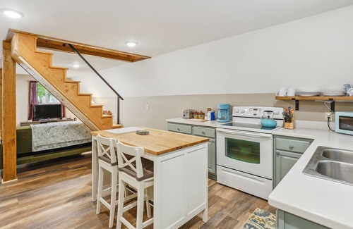 Ludington Cabin | Cozy Michigan Escape w/ Deck, Fire Pit & Grill!