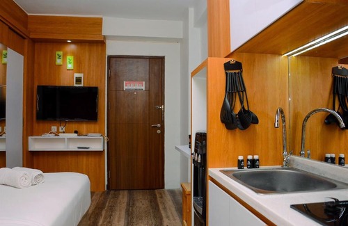 Bekasi Timur Apartment | Cozy Modern Studio at Lagoon Apartment near Bekasi Town Square By Travelio