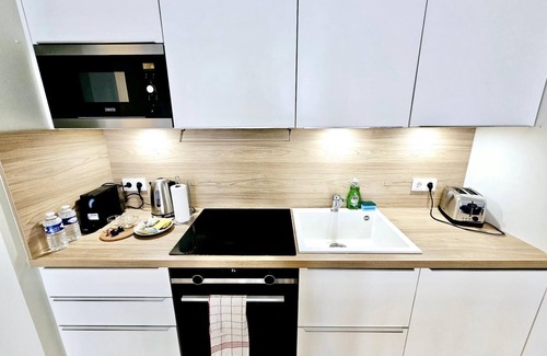 Gasperich Apartment | Cozy one bedroom with convenient parking