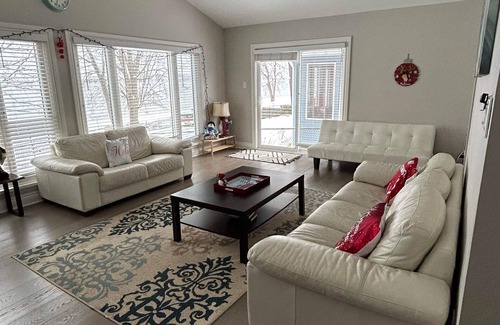 Laurentian Valley House | Cozy Ottawa River Retreat: Festive Decor, Fireplace, & Scenic Views Await