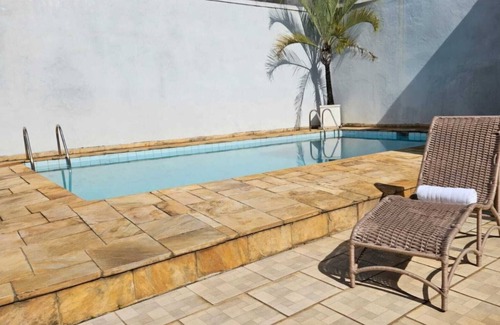 Sao Paulo Apartment | Cozy private suite with reading space, swimming pool and sauna.