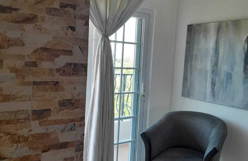 IronShore Estates Apartment | Cozy & Private Retreat - overlooking mountain and sea views