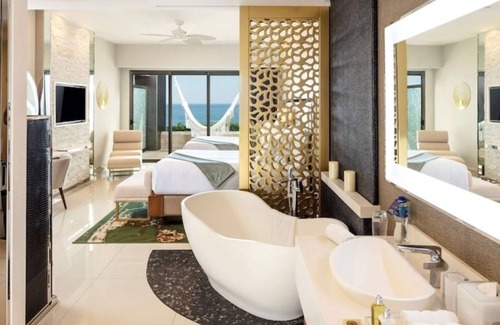 El Tezal Resort | Cozy room in a resort with AC, WiFi. Free Yoga, Gym, & beach bike at the resort